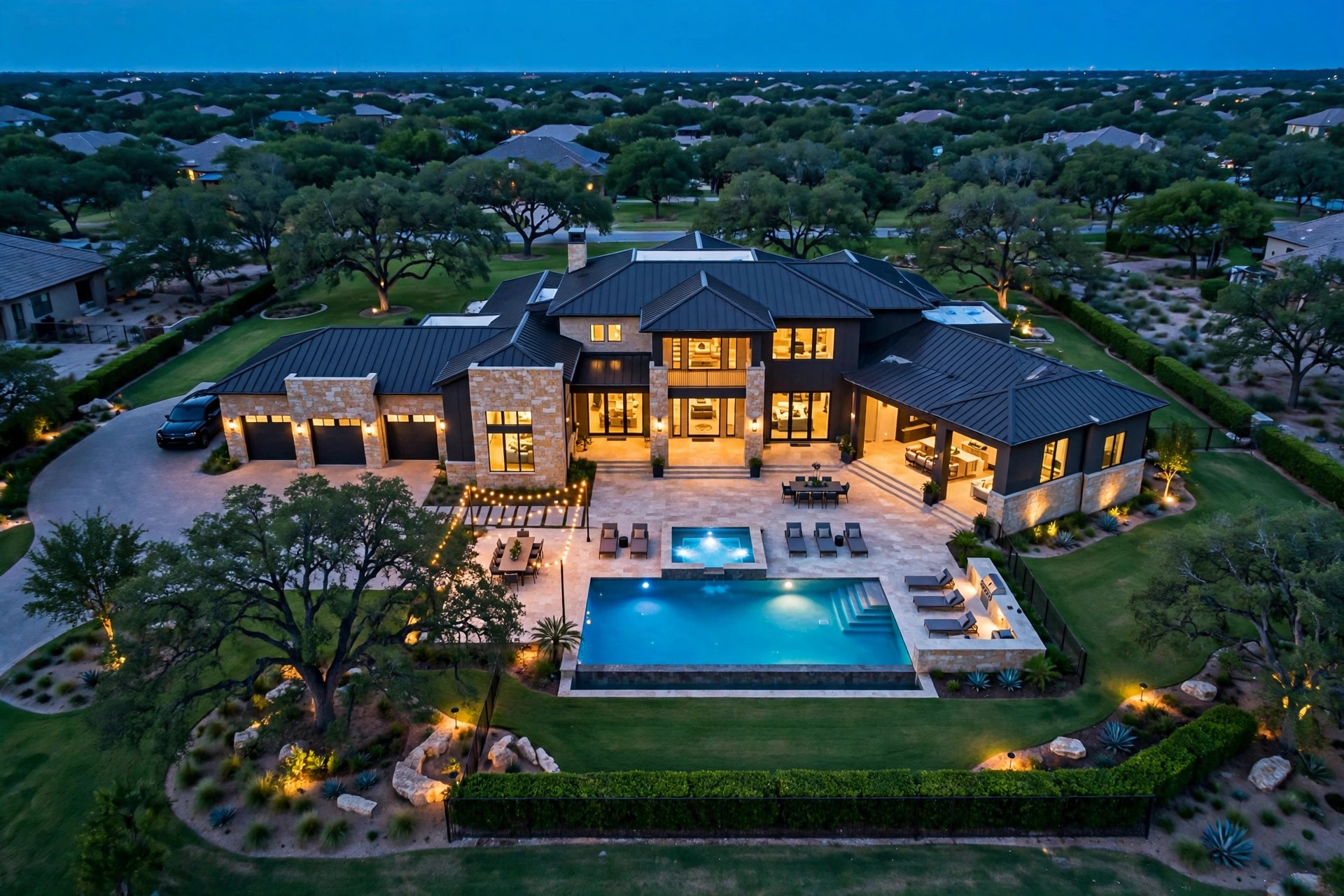 Luxury home aerial at twilight